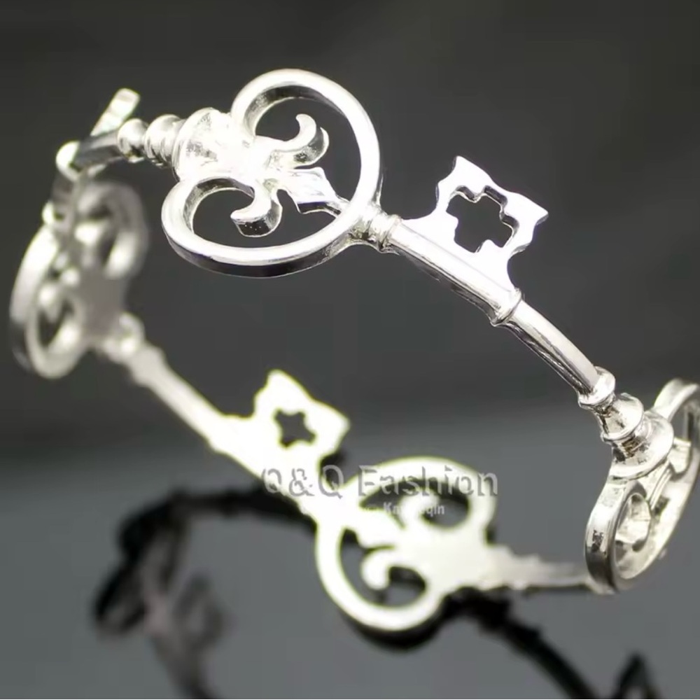 New. Polished Silver Skeleton Key Bangle bracelet